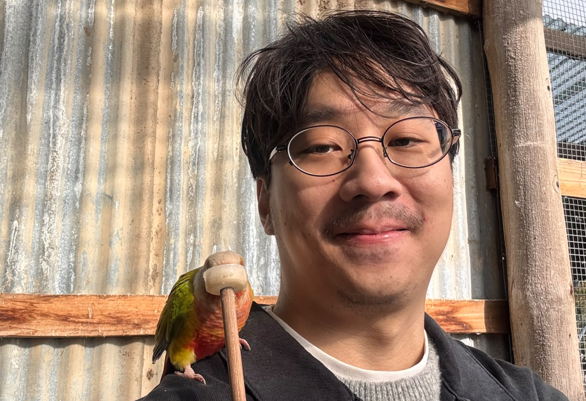 Ben with a colourful bird